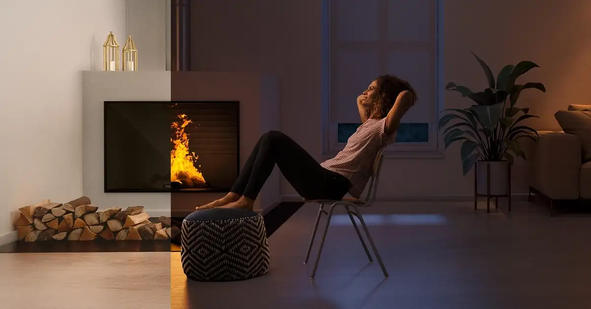 Hogar a leña con panel vitrocerámico SCHOTT ROBAX NightFlame encendido